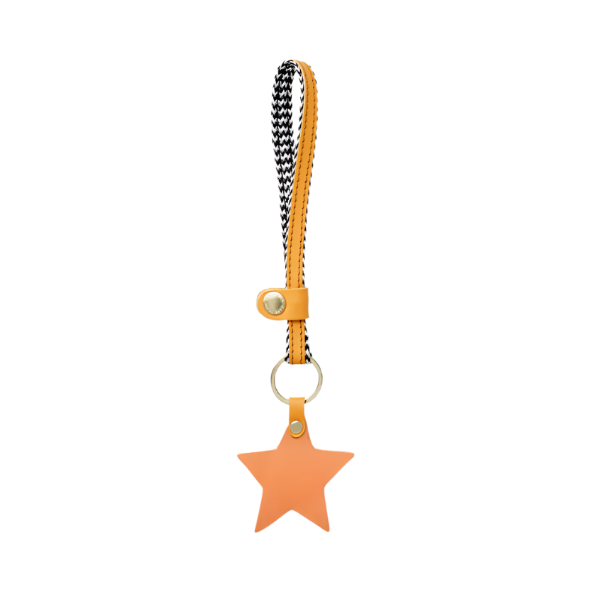 Orange Star-shaped keychain with a yellow strap on a white background